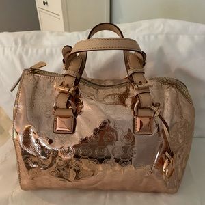 Authentic Michael Kors Rose Gold purse.  Like new.